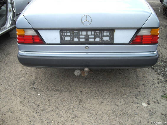 Бампер задний Mercedes 124