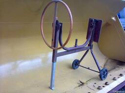 Рычаг, круг, колесо переворота ёмкости бетономешалки.