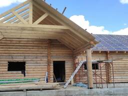 Будівництво дерев'яних будинків із зрубу в Україні та за кордоном