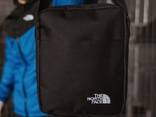 Чоловіча барсетка The North Face чорна , Reebok синя - фото 1