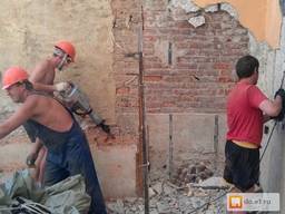 Демонтаж перегородок різання арок, дверних отворів