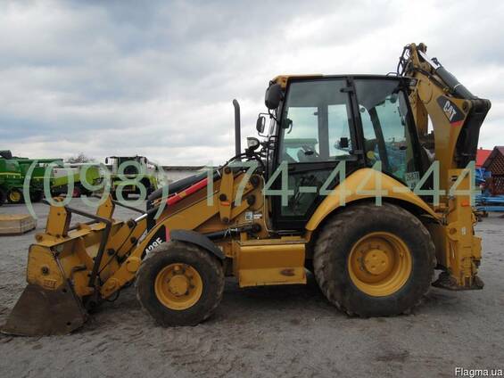 Экскаватор-погрузчик CAT 428E (екскаватор Катерпиллер 428E)
