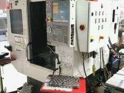 Фрезерний станок с ЧПУ HAAS DT1