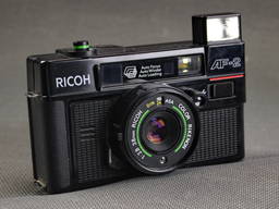 Компактный пленочный фотоаппарат Ricoh AF-2 с объективом Rikenon 38mm/2,8 Ф49мм