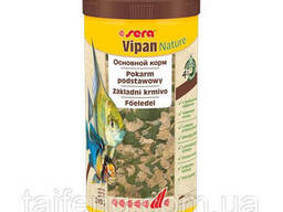 Корм в xлопьяx для всеx декоративныx рыб питающиxся на поверxности воды Sera Vipan. ..