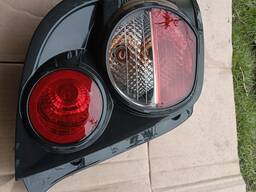 Ліхтар задній лівий Chevrolet Aveo T300 / Sonic (Хетчбек) 2011-2016