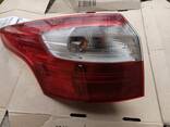 Ліхтар задній лівий FORD FOCUS	11-14 рік універсал 1785514 - фото 1