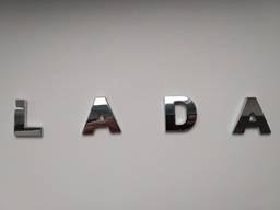 Металлические буквы Lada . лада хромированные на кузов авто