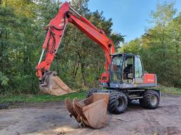 Оренда/послуги екскаватора O&amp;K MH Plus екскаватор колісний спецтехніка