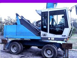 Перегружатель асфальта Fuchs MHL 340 2006г 10700 Моточасов