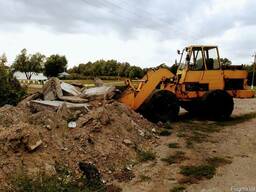 Послуга фронтального погрузчика навантажувача.