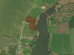 Продам ОСГ возле водоёма под сад 2по2га или частями.6500$/га