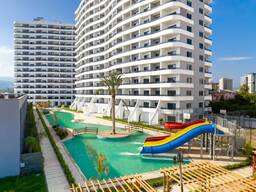 Продаж 1к 76м2 BULUT Gloria Mersin, Erdemli