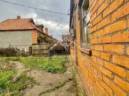 Продаж будинку з гаражем у ЦМ районі (карнаватка)