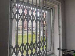 Решетки металлические раздвижные на окна, двери, балкон Харьков