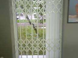 Раздвижные решетки металлические на окна , двери. витрины Одесса
