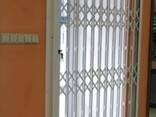 Розсувні решітки для вікот та дверей - фото 3