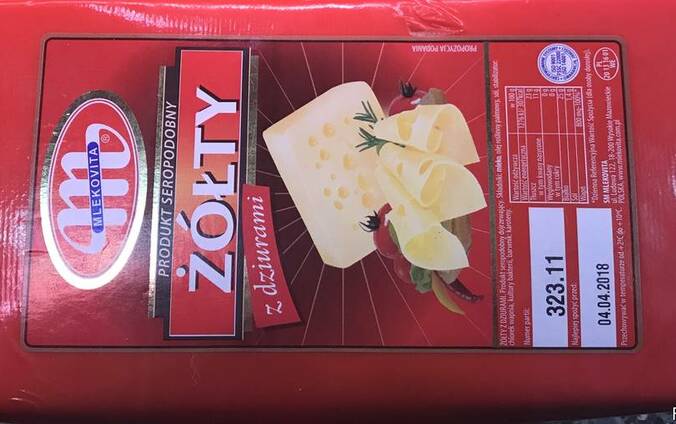 Сырный продукт Желтый с Дырами Польский оптом