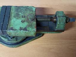 Тиски поворотные станочные