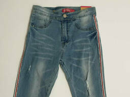 Тонкие узкие рваные джинсы для девочки в голубом цвете