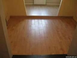 Укладання ламінату Київ.