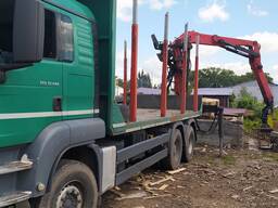 Услуги лесовоза с манипулятором MAN TGS (разгрузка/загрузка)
