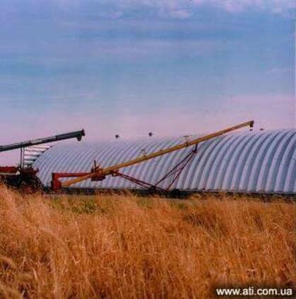 Зернохранилища напольного типа - стальные зерносклады